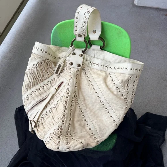 Ivory Isabella Fiore ruched brass grommets studded large leather hobo bag

- - Picture 4 of 16